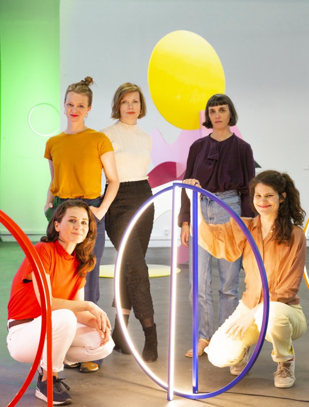 What If Now Exhibition artist portrait with sculptures